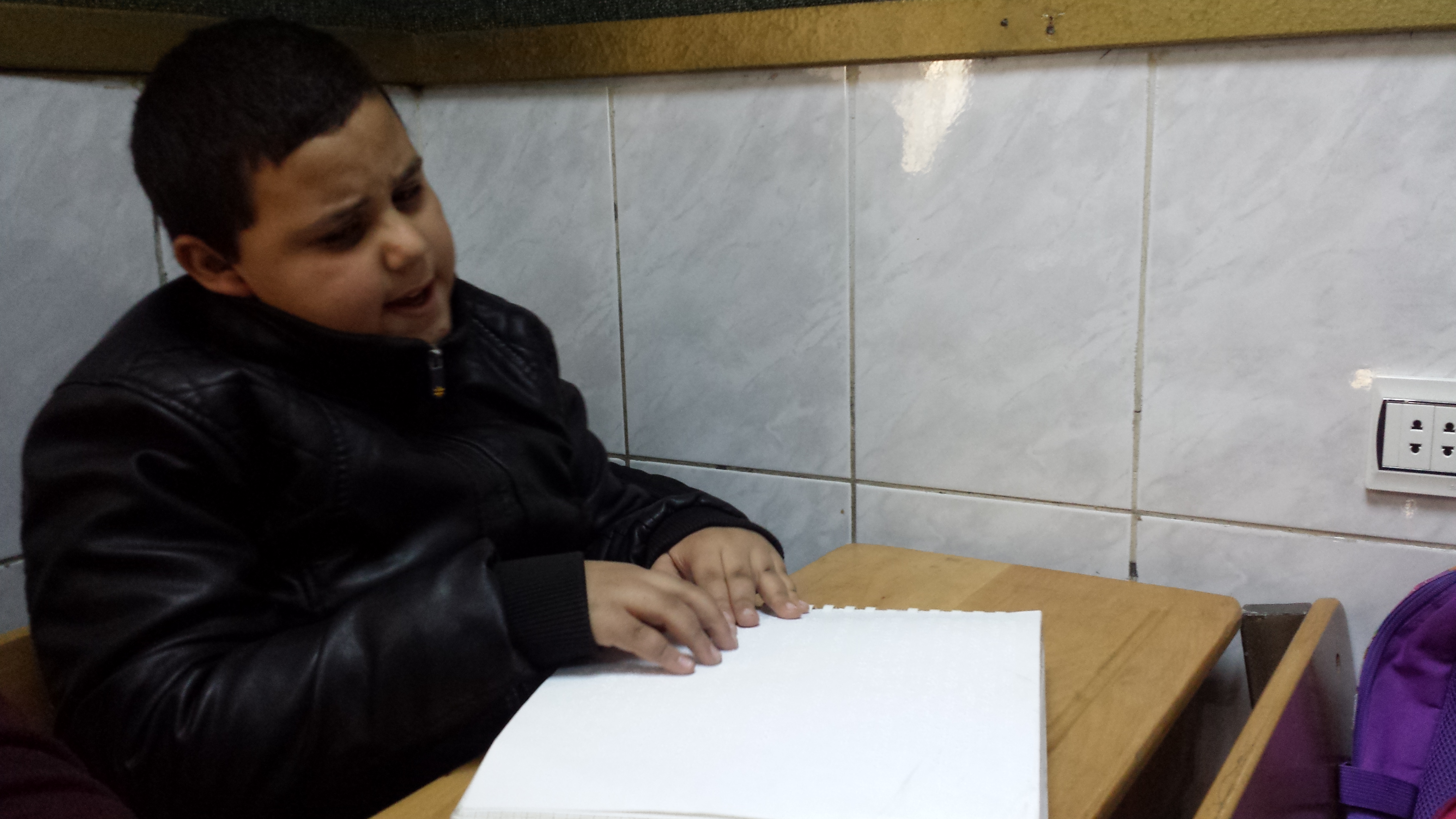 exam period - Bah'ra reading braille